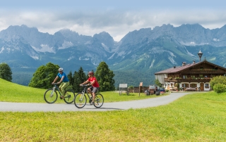 Photo: Bergdoktor bike tour at the apartment house of your vacation apartment on vacation with dog in Söll Tyrol Austria Wilder Kaiser