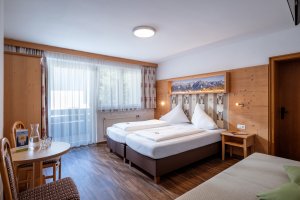 Dreibettzimmer im Hostel Dorfglück
