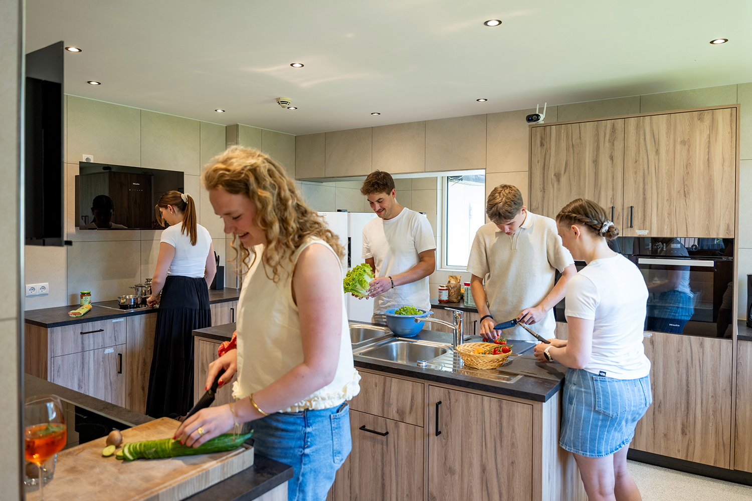 Young People In The Kitchen